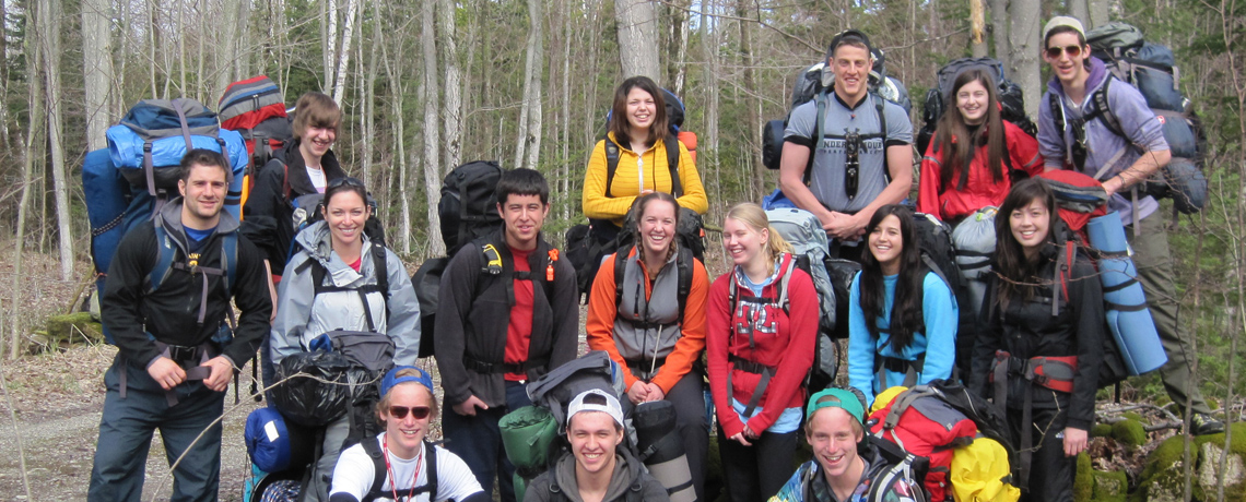 Group of young hikers in the woods